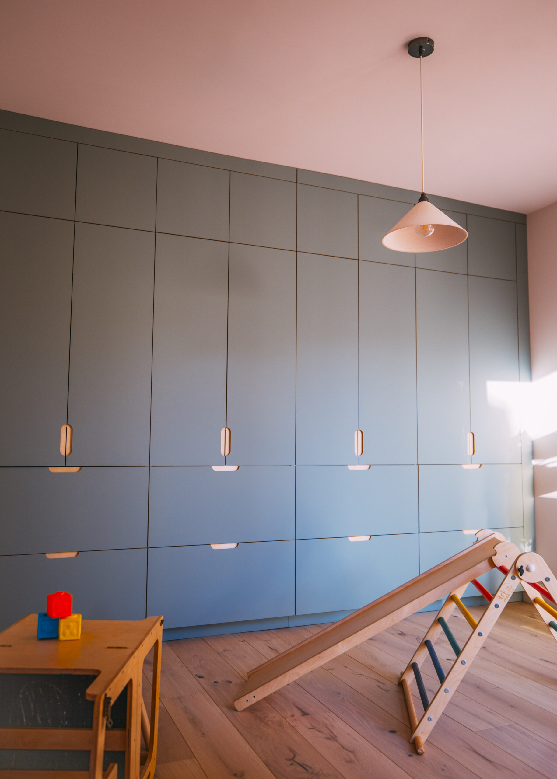full-wall-bespoke-pale-blue-kidsroom-joinery.jpg