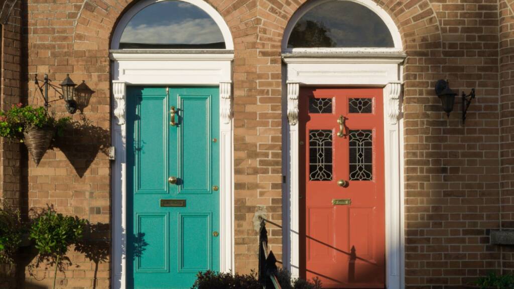 Two neighbouring homes, one recently extended, showing planning permission differences.